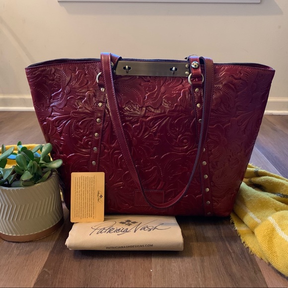 Patricia Nash Handbags - NWT REG. $249
PATRICIA NASH BENVENUTO XL TOTE
COLOR OCHRE
(EARTHY RED)